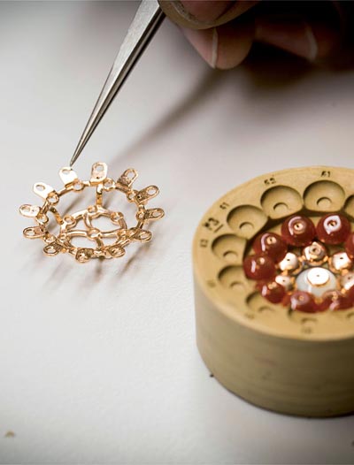 - Assembling the open-work plate on the pendant