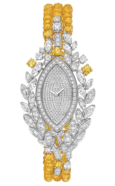 Montre Moisson dOr en or blanc et jaune 18K sertis de 13 diamants taille marquise pour un poids total de 2,1 carats, 365 diamants taille brillant pour un poids total de 3,5 carats, 7 saphirs jaunes taille brillant pour un poids total de 1,4 carat et 119 billes de saphir jaune pour un poids total de 48 carats