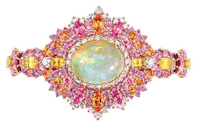 Dior Exquise Opal High Jewellery Timepiece  750/1000 pink and white gold, diamonds, pink sapphires, yellow sapphires, light opal, spessartite garnets, purple sapphires and rubiesQuartz movement - Ref.: JOLY93023