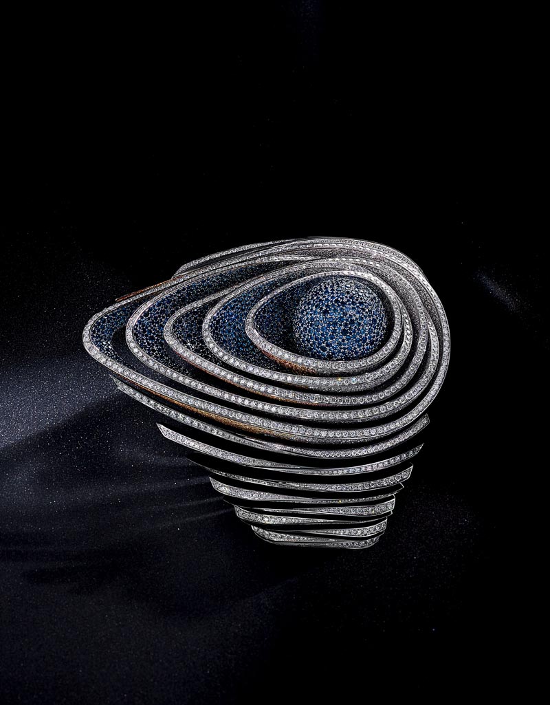- More than 12 000 stones are rigorously selected and set by hand